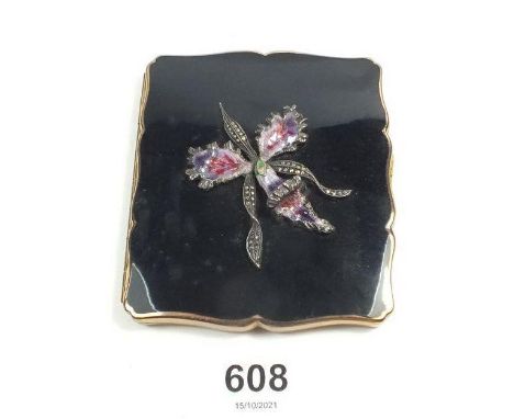 A Stratton enamel and marcasite compact decorated orchid 