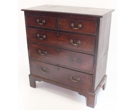 A George III mahogany chest of two short and three long drawers all raised on tall bracket supports, 97cm wide 