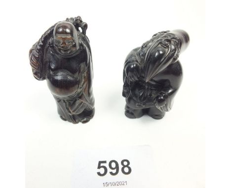 Two Japanese carved wood netsuke of men 