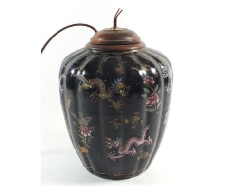 A Chinese vase painted dragons and flowers on a black ground, now converted to a table lamp