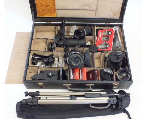 A Mamiya 645 SLR camera and various lenses including 1:4 210 mm cased and a 1:2.8 45mm lens cased plus Vetiver flash, pistol 