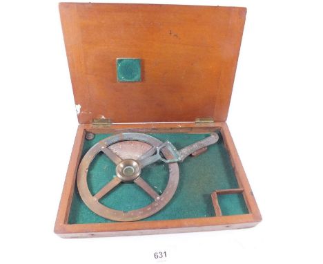A brass navigation tool by E R Watts &amp; Son, in mahogany case