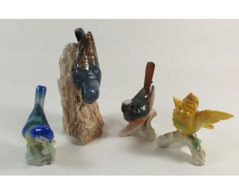 Three Goebel birds and one other