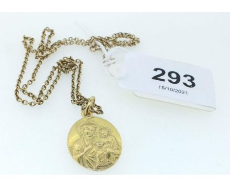 An 18 carat gold pendant of the Madonna, 2.5g and a 9 carat gold chain, 3.6g 