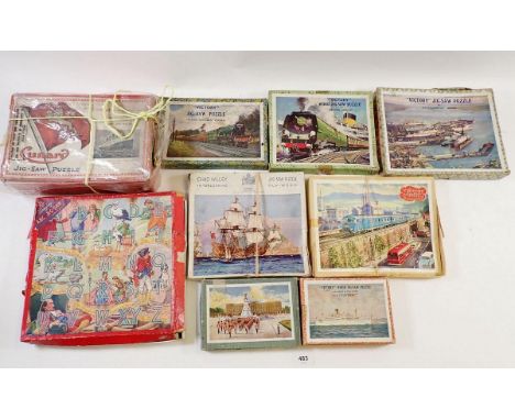 Nine various jigsaws including Chad Valley, Victory etc. with trains, ships and military subjects - all complete except Cunar