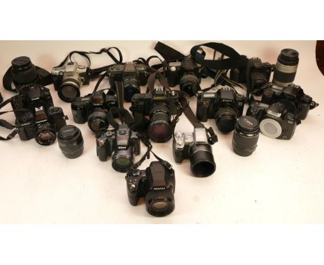 A Collection of cameras, to include Digital and Film SLRs, Pentax *ist L2, Canon EOS 400D, etc