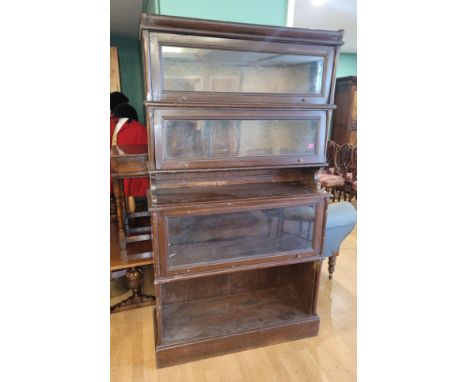 An early 20th century mahogany Globe Wernicke style waterfall bookcase, H-188cm, W-107cm, D-38cm