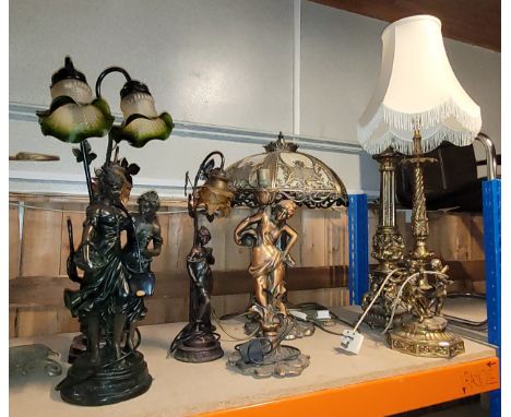 A collection of art nouveau style figural table lamps, together with two gilt brass neoclassical style table lamps. (7) Condi