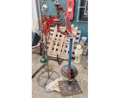 An assortment of tools, to include a floor standing Stenorizer tyre press, a trailer winch, and a floor standing workshop lig