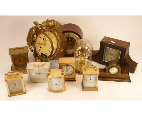 A collection of mid 20h century and later mantel, carriage and anniversary clocks, having manual and quartz movements. (3)