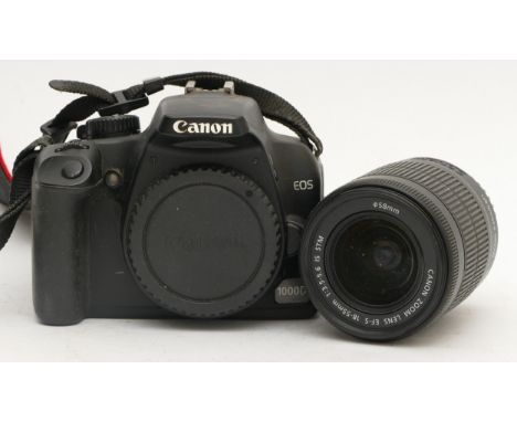 A boxed Canon EOS 1000D DSLR camera, with 18-55mm IS lens