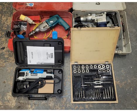 An assortment of power tools, to include, a Makita 110V drill, a Ferm percussion drill, a Mac multi-tool with box, and a Scre