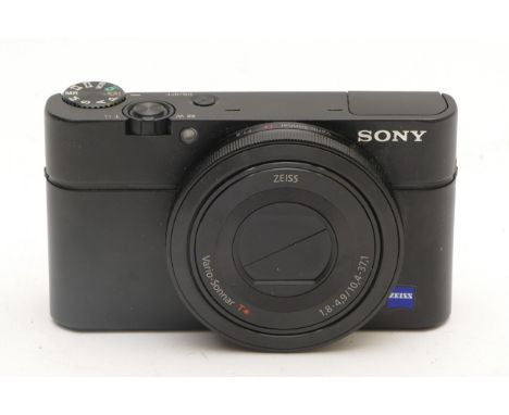 Sony Cybershot DSC-RX100 digital compact camera with Zeiss lens, case