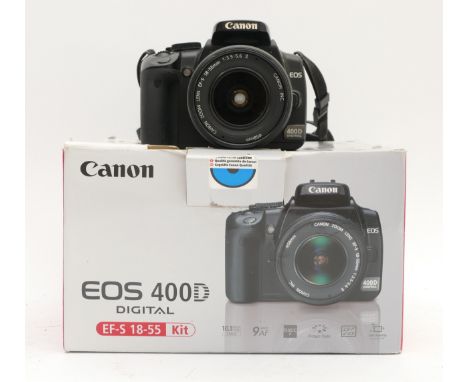 a boxed Canon EOS 400D DSLR camera, with 18-55mm lens