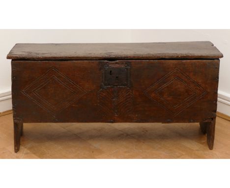 An 18th century oak six plank chest, the hinged top, panelled front and sides on stile supports, H46,W91, D31cm.