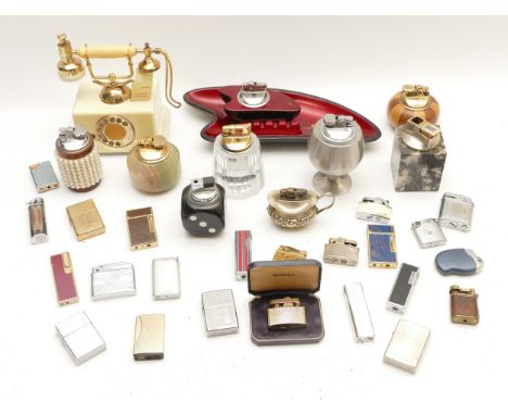 A collection of 20th century cigarette lighters, pocket, table and novelty examples, petrol and gas operated.