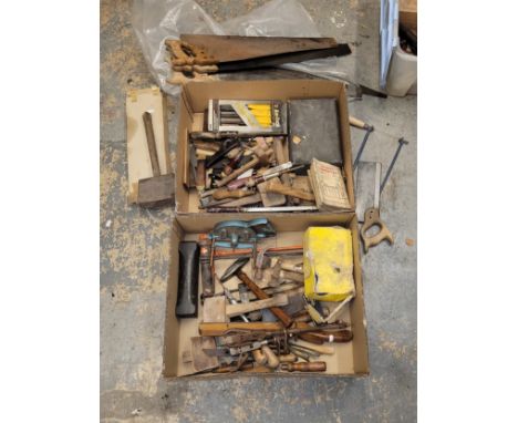 An assortment of carpenter's tools, including saws.