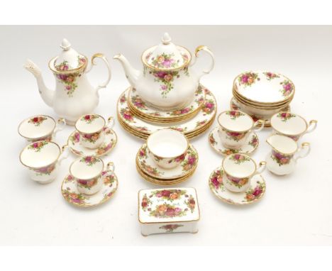 A Royal Albert Country Roses thirty piece dinner/coffee service, comprising tea & coffee pots, dinner plates, side plates, sa