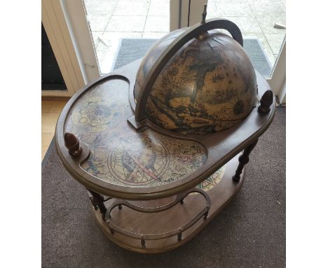 A mid 20th century globe drinks/cocktail trolley, adjoined with classical illustration of Poseidon/Neptune and turned support