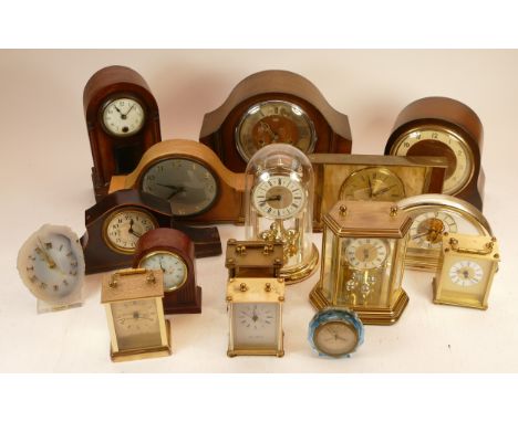 A collection of mid 20h century and later mantel, carriage and anniversary clocks, having manual and quartz movements. (4)
