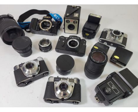 A Collection of Cameras, to include a Sigma 600mm Mirror lens, Minolta, Kowa, Kodak, Agfa