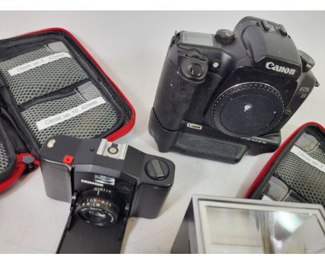 A Collection of Cameras, to include a Canon EOS 33 with grip, Minox 35 EL, Sigma 200mm lens, Metz Flash