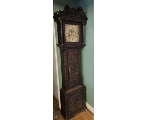 Thos Lister, an 18th century 12" brass dial, eight day longcase clock, in a later carved oak case, moonphase and date apertur