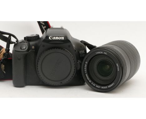 A boxed Canon EOS 550D DSLR camera, with 18-135mm IS lens