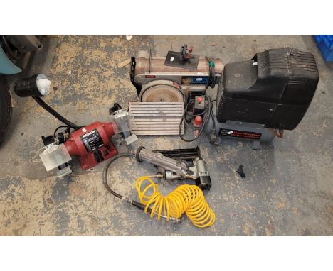 A performance power compressor, paired with a Rexon bench grinder.