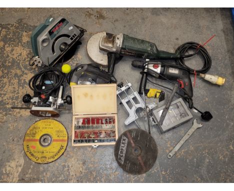 An assortment of power tools, to include, a Metabo nine inch angle grinder, a ripsaw, a 100V challenge plane, a Draper router