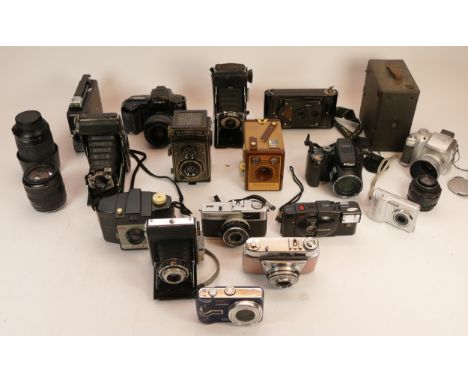 A Collection of Cameras to include Olympus Trip 35, XA2, Minolta Dynax 9xi, Nikon Coolpix P100, 4x folding bellows cameras, C