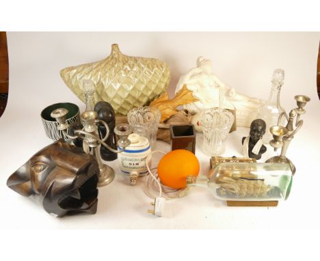 A collection of homewares, to include antlers, novelty cast iron figural money box, glassware, plateware, prints an accordion