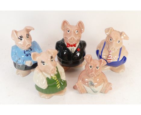 A set of five Natwest ceramic piggy banks, by Wade.