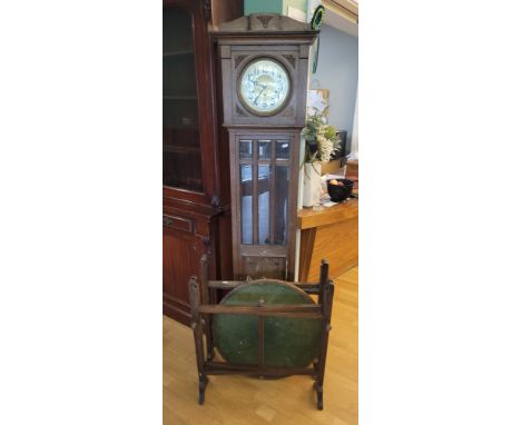 An oak Edwardian longcase clock, brass time dial with silhouetted chapter ring bearing arabic numerals, housing an 8 day barr