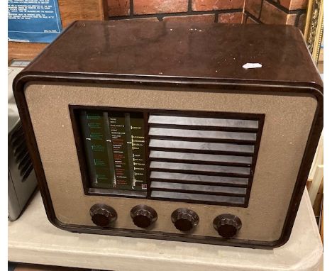 A mid 20th century Ferranti 005 bakelite valve radio, together with a cased Elliott Brothers capacity testing set. (2)