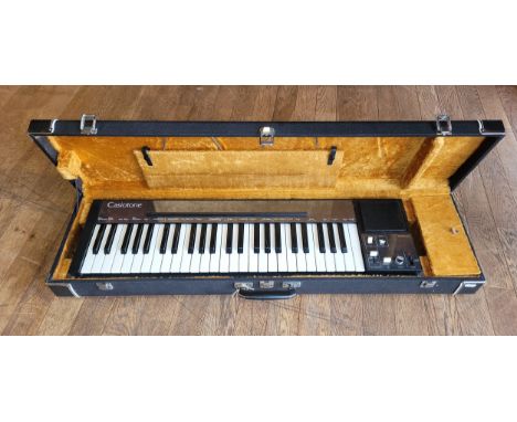 A Casiotone electric keyboard, model 201, circa 1980 in fitted hand case, with owners manual, cover and leads.