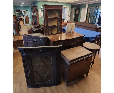 A collection of Edwardian furniture items, to include carved oak condor cabinets, a mahogany inlaid display cabinet, 103x66cm