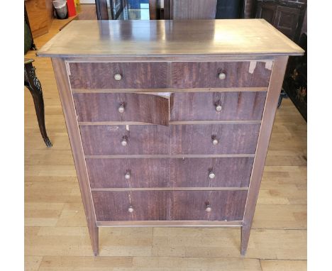 Ian Henderson, a mid 20th century veneered teak tallboy chest of drawers, having two short over three long drawers with turne