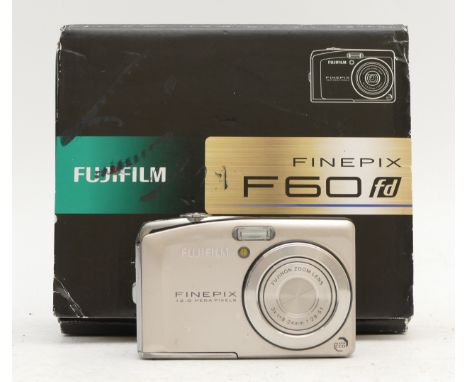 A Fujifilm Finepix F60 digital camera, serial number 8DQ09679