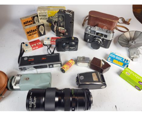 A Collection of Cameras, to include a boxed Minolta 16, Sigma zoom lens, Fed 4 camera, ITT camera, Olympus XA-1, Midas 9.5 ca