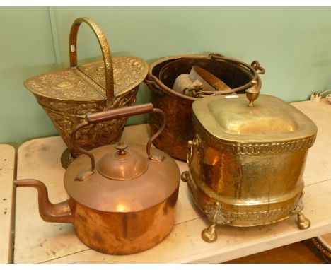A collection of late 19th century and later brass and copper wares, to include large swing handled cooking cauldrons, an over
