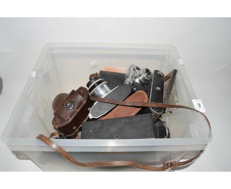 A box of various vintage cameras to include Prontor II, a Braun Gloria and others