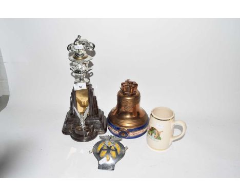 Mixed Lot: Vintage AA badge, a vintage ceramic Whiskey bell, trophy and a further mug