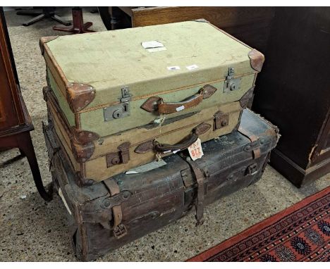 Three vintage suitcases