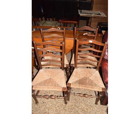 Set of four rush seated ladder back kitchen chairs