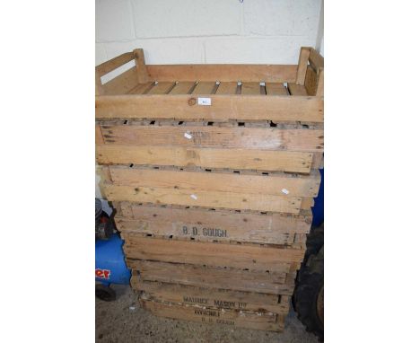 Stack of vintage wooden apple or potato chitting crates