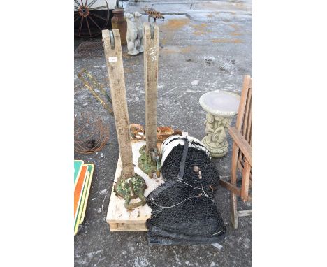 Mixed Lot: Vintage cast base tennis posts together with net and a vintage iron white line marker