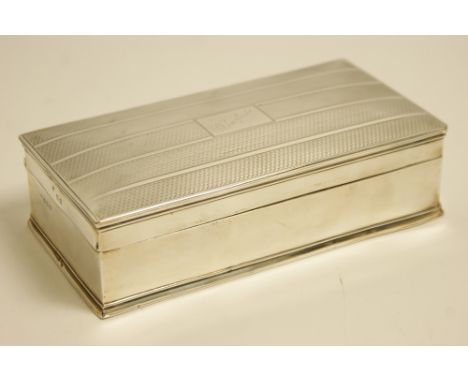 George V silver cigarette box, Birmingham 1927, engine turned decoration, the cover inscribed 'Winifrede', 17cm