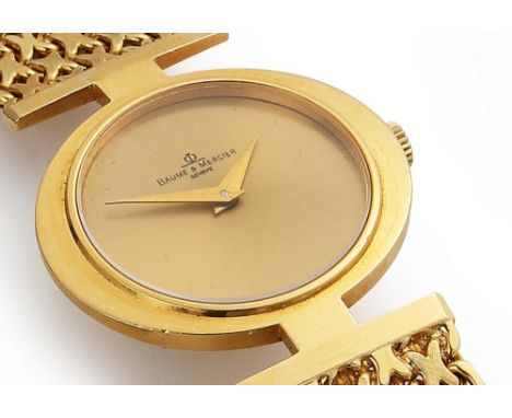 Baume & Mercier lady's 18ct gold bracelet wristwatch, elliptical case with round 20mm gold coloured dial, signed, manual wind