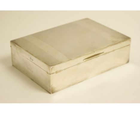 Modern silver cigarette box, Birmingham 1957, rectangular form with engine turned decoration, cedar lined interior, 17cm